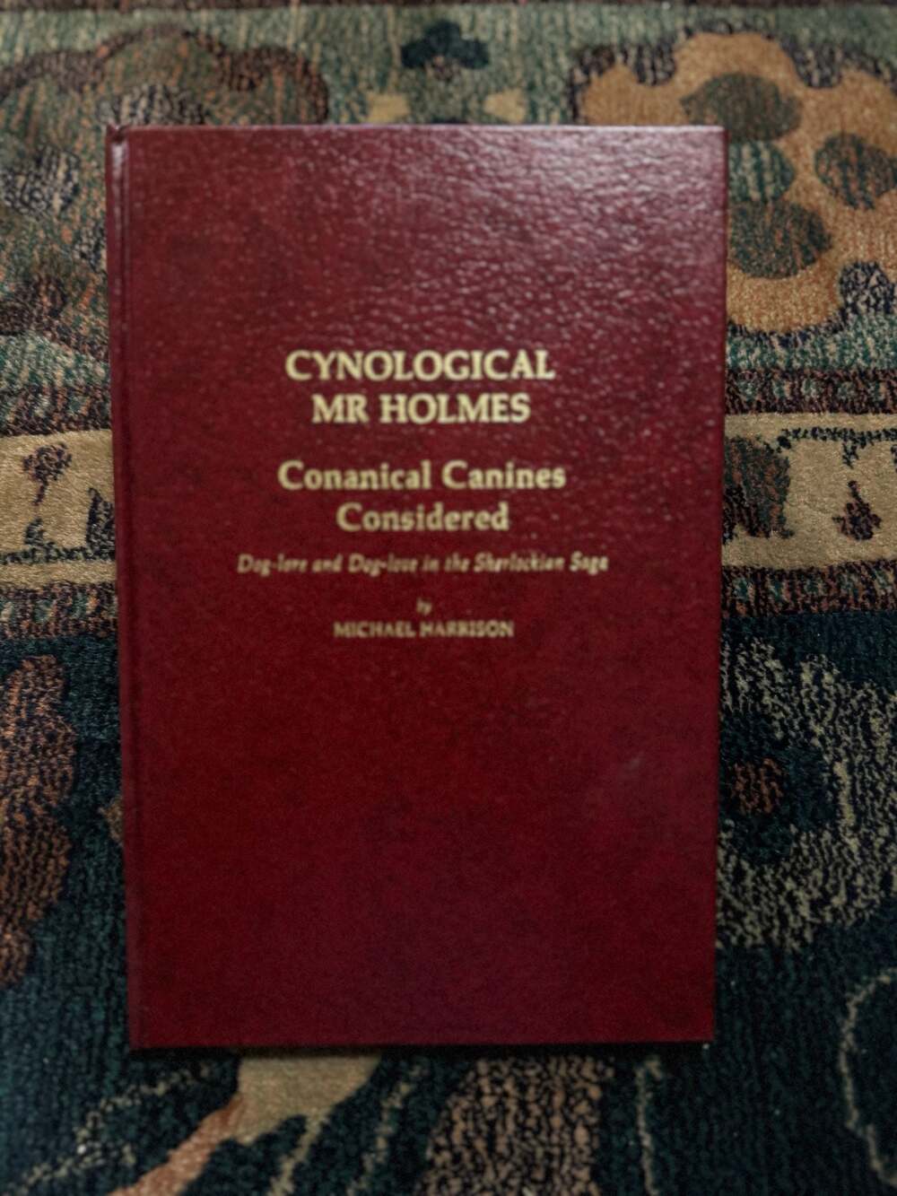 Cynological Mr Holmes: Conical Canines Considered by Michael Harrison (1985)